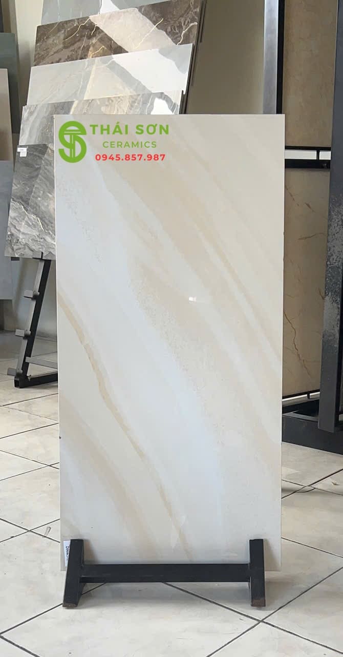 Gạch 40x80 trung quốc ốp tường bóng kiếng màu vàng kem vân đá