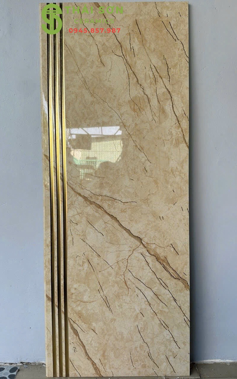 Gạch cầu thang 47x120 trung quốc màu vàng khắc kim