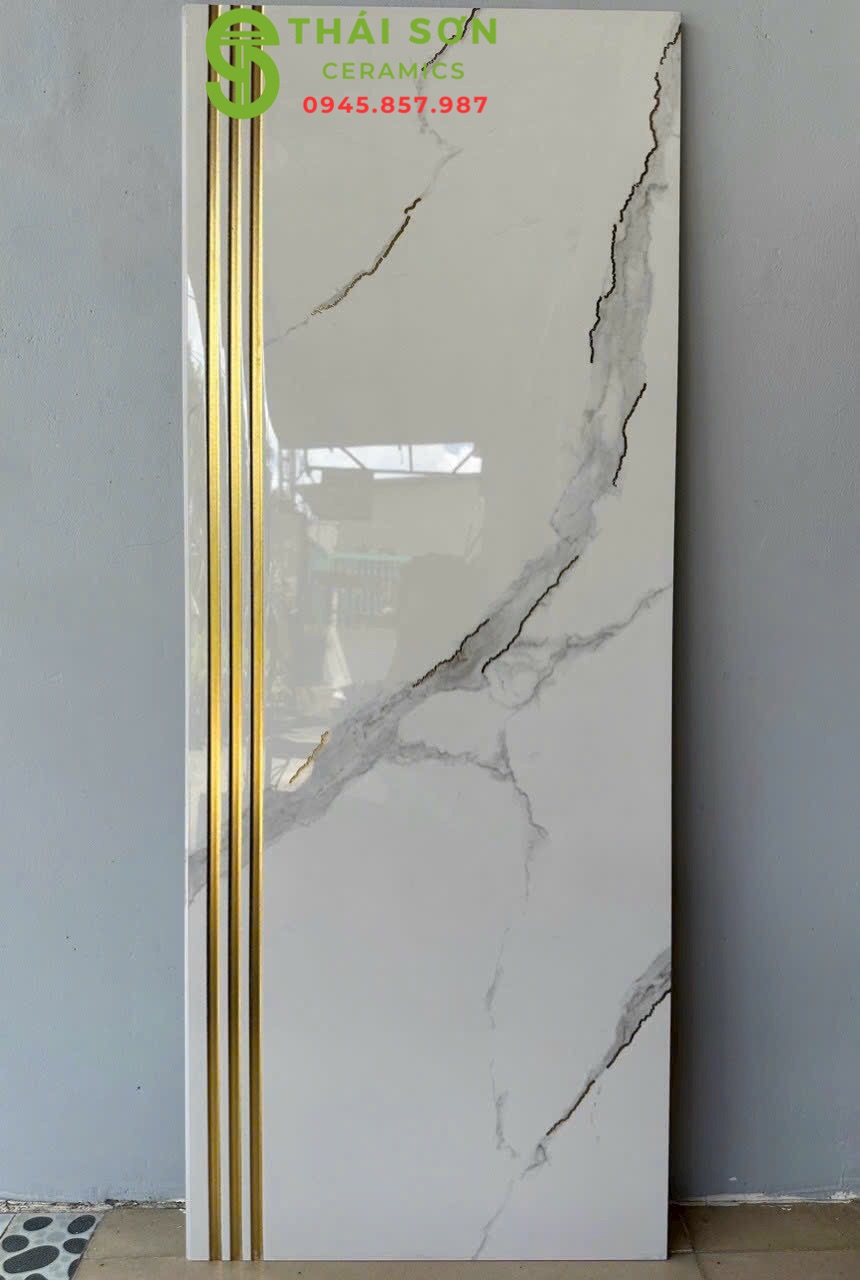 Gạch bậc cầu thang 47x120 trung quốc trắng khắc kim