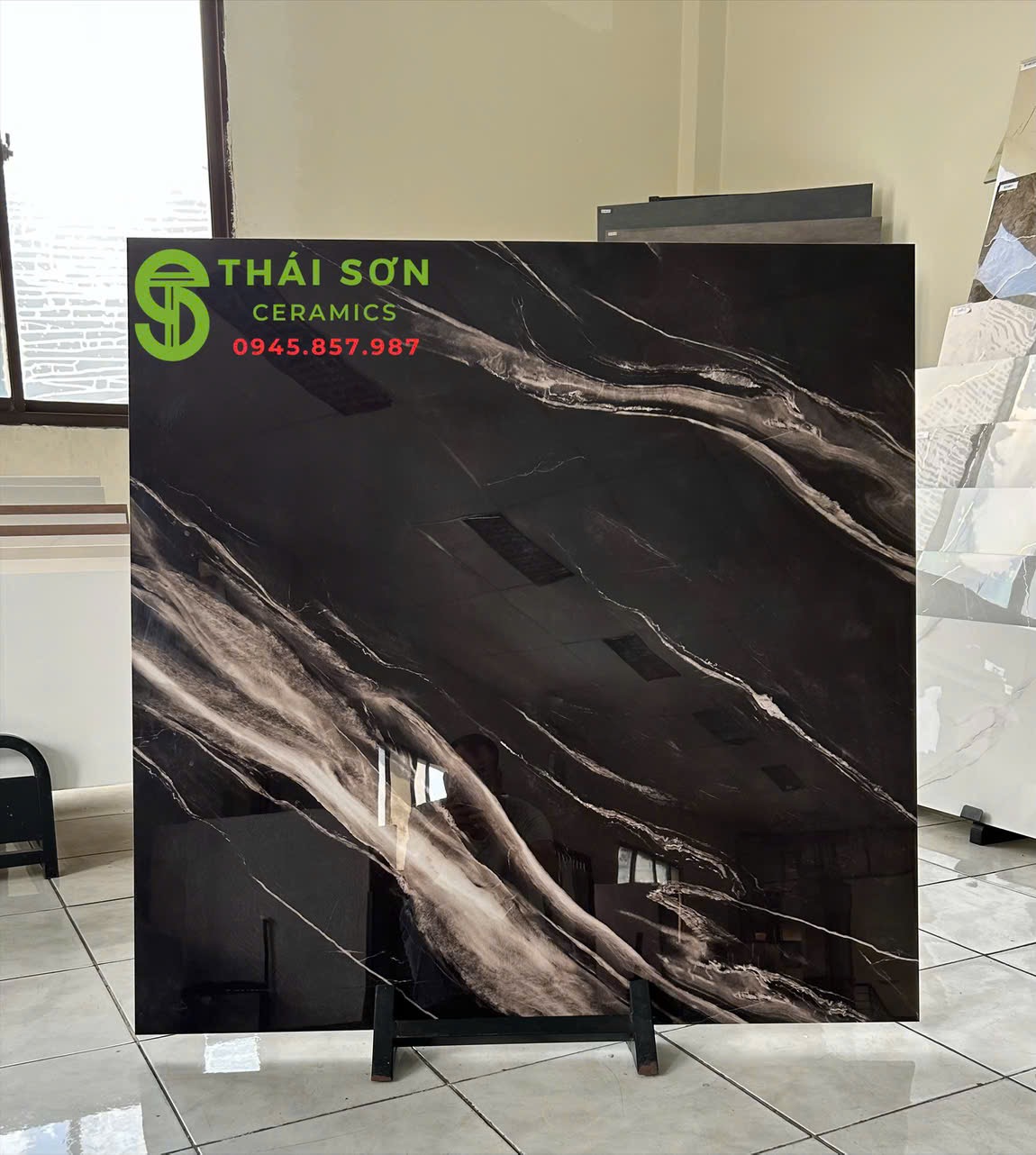 Gạch trung quốc 100x100 đen tuyền vân trắng