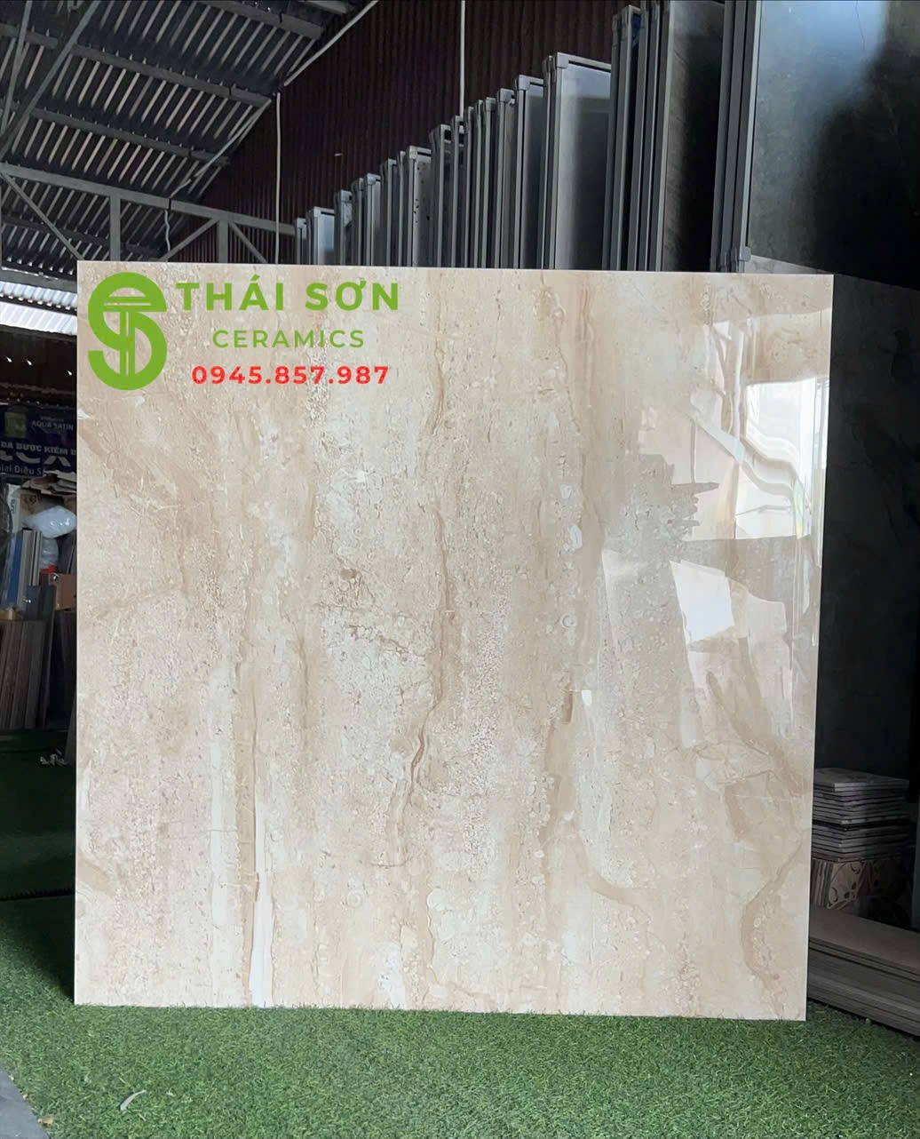 Gạch ấn độ 120x120 lát nền màu kem vân gỗ bóng kính