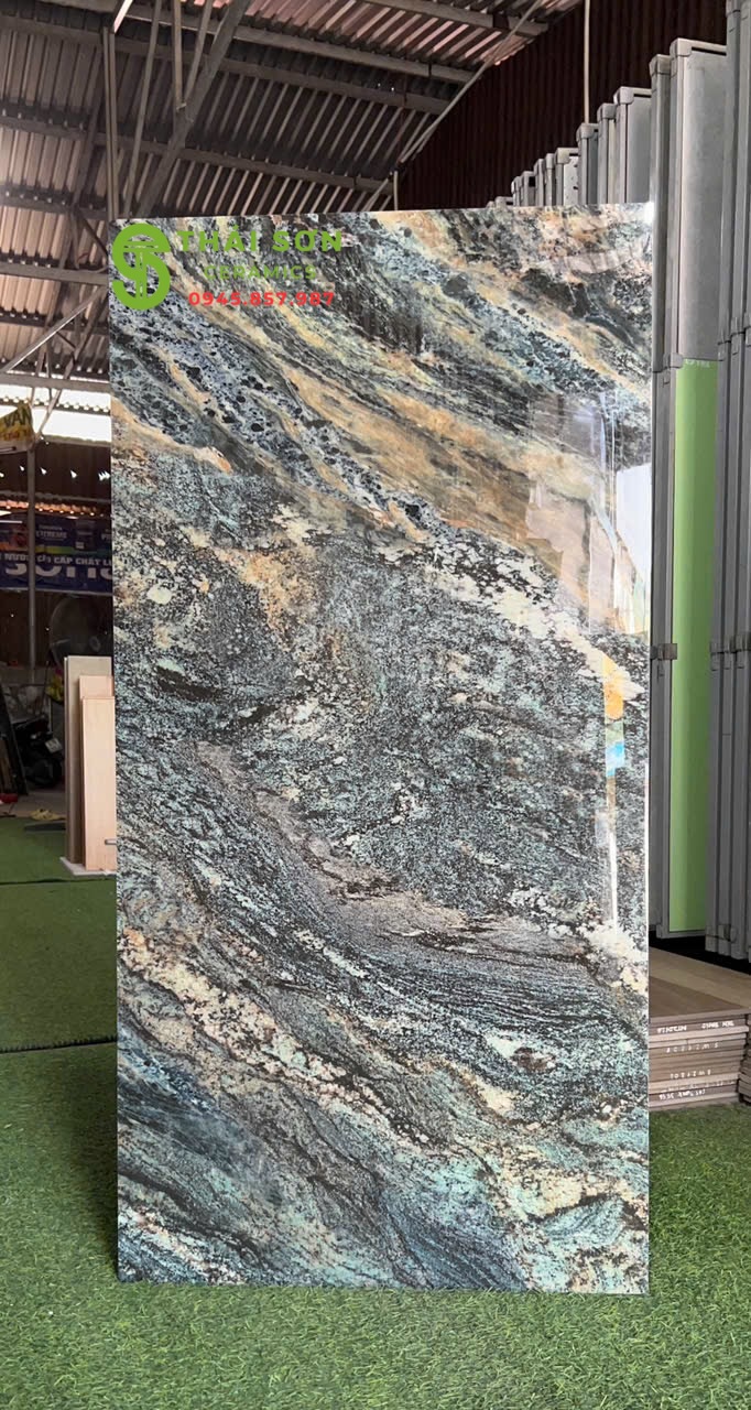 Gạch lát nền 60x120 catalan bóng kiếng màu xanh vân đá