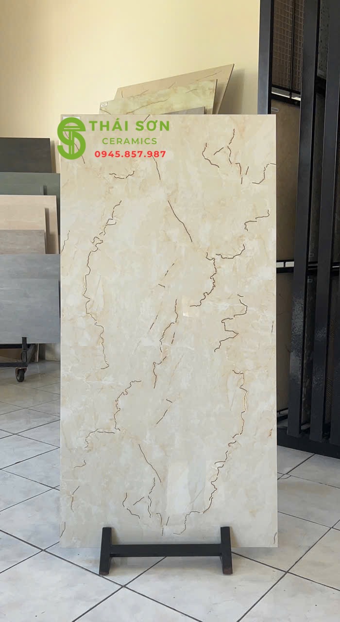 Gạch lát nền 60x120 trung quốc khắc kim màu vàng kem nhạt