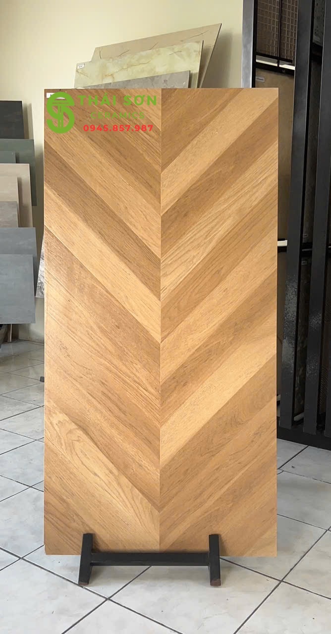 Gạch vân gỗ xương cá 60x120 trung quốc lát nền màu nâu mật ong