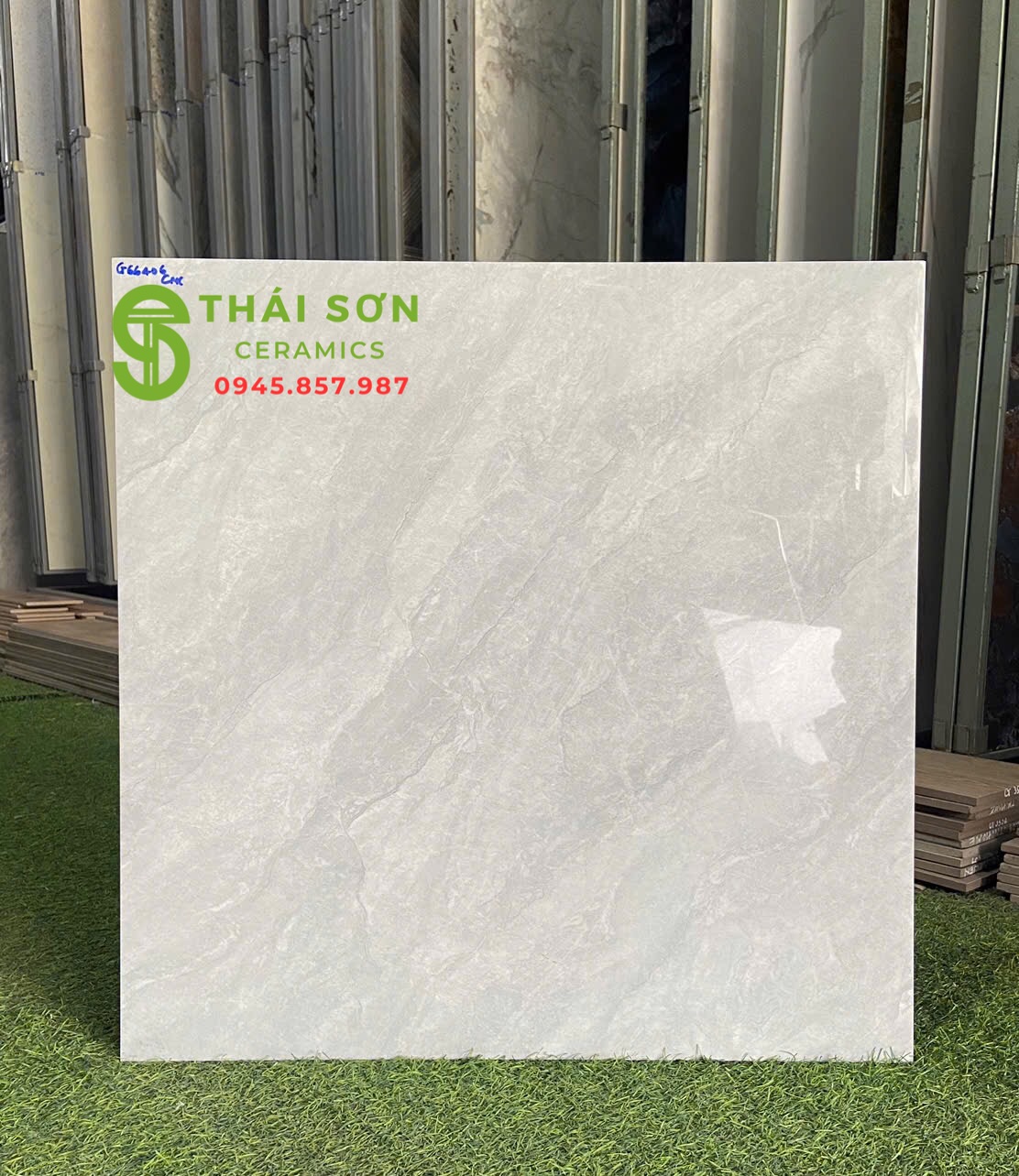 Gạch cmc 60x60 bóng kiếng xám vân đá lát nền nhà phố 