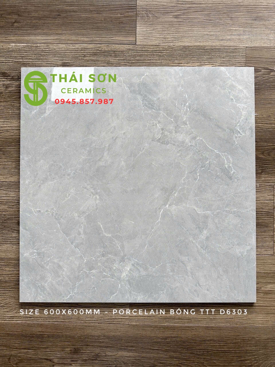 Gạch takao lát nền 60x60 bóng kiếng màu xám vân