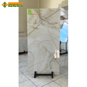 Gạch lát nền 60x120 trung quốc bóng kiếng vân đá khắc kim vàng