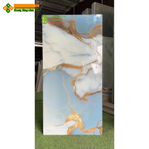 Gạch lát nền 60x120 siêu bóng màu xanh trắng chỉ vàng