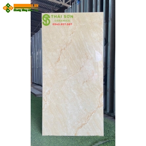 Gạch lát nền tasa 60x120 bóng kiếng màu vàng vân đá