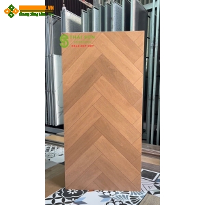 Gạch vân gỗ xương cá 60x120 trung quốc lát nền tông màu nâu vàng ấm
