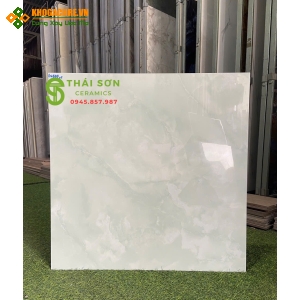 Gạch vitto bóng kiếng 60x60 lát nền nhà phố vân xanh