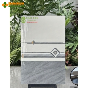 Gạch ốp tường 30x60 bóng kiếng bộ đậm nhạt xám vân đá