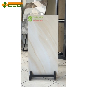 Gạch 40x80 trung quốc ốp tường bóng kiếng màu vàng kem vân đá
